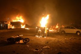 Vehicles are seen burning after a bomb blast in Quetta, Pakistan August 12, 2017. REUTERS/Naseer Ahmed