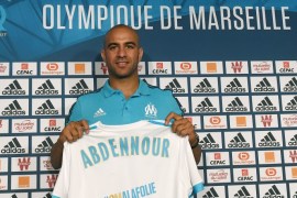 Olympique de Marseille's newly recruited player, Tunisien defender Aymen Abdennour holds his new jersey during his official presentation, on August 30, 2017 at the Robert-Louis Dreyfus training centre in Marseille, southern France. Tunisian international defender Aymen Abdennour has joined Marseille on loan from Valencia, the French club announced on August 29 evening. / AFP PHOTO / BORIS HORVAT (Photo credit should read BORIS HORVAT/AFP/Getty Images)