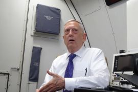 US Defense Secretary James Mattis speaks to reporters on board a flight to Jordan for the start of a regional tour on August 20, 2017. / AFP PHOTO / Paul HANDLEY (Photo credit should read PAUL HANDLEY/AFP/Getty Images)