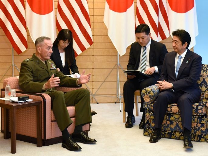 General Joseph Dunford (L), the chairman of the U.S. Joint Chiefs of Staff, meets with Japan's Prime Minister Shinzo Abe (R) at Abe's official residence in Tokyo, Japan August 18, 2017. REUTERS/Kazuhiro Nogi/Pool