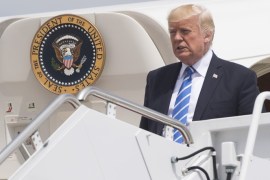 US President Donald Trump disembarks from Air Force One upon arrival at Hagerstown Regional Airport in Hagerstown, Maryland, August 18, 2017, as he travels for meetings at Camp David before returning to Bedminster, New Jersey to continue his vacation.US President Donald Trump is assembling his national security team at the Camp David presidential retreat Friday to forge a way ahead in Afghanistan, almost 16 years after the war began. Trump must decide if he wants to continue on the current course, which relies on a relatively small US-led NATO force to help Afghan partners push back the Taliban, or if he wants to try a new tack such as adding more forces -- or even withdrawing altogether. / AFP PHOTO / SAUL LOEB (Photo credit should read SAUL LOEB/AFP/Getty Images)