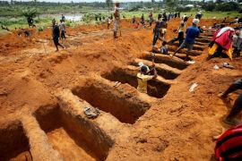 Workers are digging graves at the Paloko cemetery in Waterloo, Sierra Leone August 17, 2017. REUTERS/Afolabi Sotunde TPX IMAGES OF THE DAY