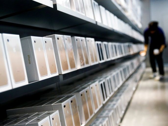 Apple's new iPhone 7 smartphones sit on a shelf at an Apple store in Beijing, China, September 16, 2016. REUTERS/Thomas Peter/File Photo
