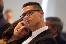 MADRID, SPAIN - NOVEMBER 07: Cristiano Ronaldo of Real Madrid looks on with his mother Maria Dolores dos Santos Aveiro during his press conference after signing a new five-year contract with the Spanish club at the Santiago Bernabeu stadium on November 7, 2016 in Madrid, Spain. (Photo by Denis Doyle/Getty Images)
