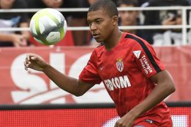 Monaco's French forward Kylian Mbappe warms up before the French Ligue 1 football match between Dijon FCO and AS Monaco, on August 13, 2017 at Gaston Gerard stadium in Dijon, northern France. / AFP PHOTO / PHILIPPE DESMAZES (Photo credit should read PHILIPPE DESMAZES/AFP/Getty Images)