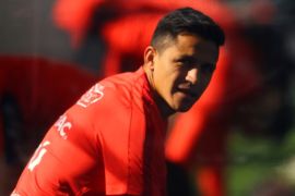 Soccer Football - Chile's national soccer team training session - World Cup 2018 Qualifiers - Santiago, Chile - August 29, 2017 - Chilean national soccer team player Alexis Sanchez attends a training session ahead of their match against Paraguay. Picture taken through a plastic tent. REUTERS/Ivan Alvarado