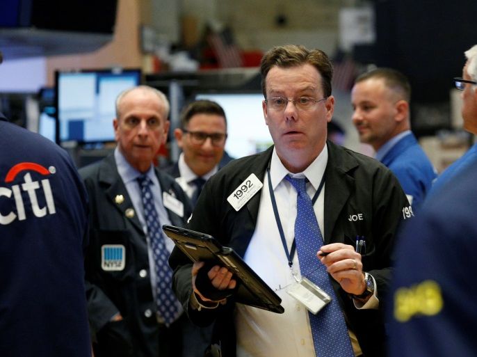 Traders work on the floor of the New York Stock Exchange (NYSE) in New York, U.S., August 17, 2017. REUTERS/Brendan McDermid
