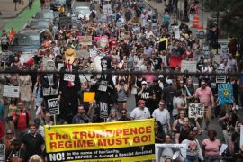 CHICAGO, IL - AUGUST 13: Demonstrators march downtown to protest the alt-right movement and to mourn the victims of yesterdays rally in Charlottesville, Virginia on August 13, 2017 in Chicago, Illinois. One person was killed and 19 others were injured in Charlottesville when a car plowed into a group of activists who were preparing to march in opposition to a nearby white nationalists rally. Two police officers were also killed when a helicopter they were using to monitor the rally crashed. (Photo by Scott Olson/Getty Images)