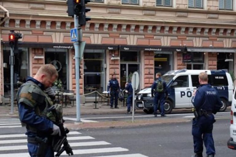 A photo taken from the instagram account of BernatMajo shows police officers patroling in a street in the Finnish city of Turku where several people were stabbed on August 18, 2017. Several people were stabbed in the street in the Finnish city of Turku with police shooting one suspect and warning several others could still be at large. Police had yet to confirm how many people had been wounded but witnesses said they had seen several bodies lying on the ground in a busy