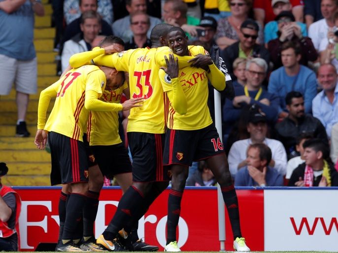 Football Soccer - Premier League - Watford vs Liverpool - Watford, Britain - August 12, 2017 Watford's Abdoulaye Doucoure celebrates scoring their second goal with Stefano Okaka and team mates Action Images via Reuters/Andrew Couldridge EDITORIAL USE ONLY. No use with unauthorized audio, video, data, fixture lists, club/league logos or