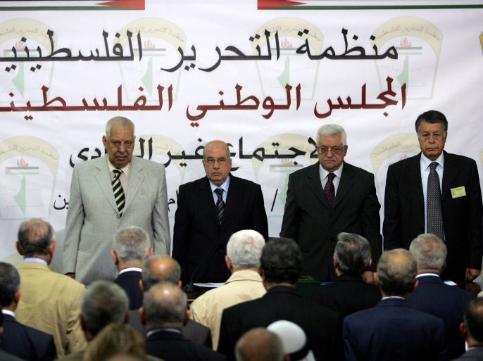 (L-R) Palestinian National Council vice chairman Taysir Qubaa, chairman Salim al-Zaanun, Palestinian president Mahmud Abbas and Palestinian representative to the Arab League Mohammed Sabih chair a PNC meeting in the West Bank city of Ramallah on August 26, 2009. The parliament of the Palestine Liberation Organisation (PLO) began its first meeting in more than a decade in the occupied West Bank to replace leaders who have died. The PNC will pick six new members of the 18-strong PLO Executive Committee headed by Abbas. AFP PHOTO/ABBAS MOMANI (Photo credit should read ABBAS MOMANI/AFP/Getty Images)
