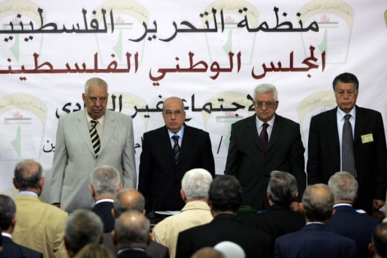 (L-R) Palestinian National Council vice chairman Taysir Qubaa, chairman Salim al-Zaanun, Palestinian president Mahmud Abbas and Palestinian representative to the Arab League Mohammed Sabih chair a PNC meeting in the West Bank city of Ramallah on August 26, 2009. The parliament of the Palestine Liberation Organisation (PLO) began its first meeting in more than a decade in the occupied West Bank to replace leaders who have died. The PNC will pick six new members of the 18-strong PLO Executive Committee headed by Abbas. AFP PHOTO/ABBAS MOMANI (Photo credit should read ABBAS MOMANI/AFP/Getty Images)