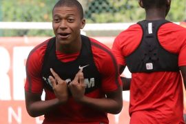 Monaco L1 football club's forward Kylian Mbappe Lottin takes part in a training session on August 11, 2017 in La Turbie, near Monaco. / AFP PHOTO / VALERY HACHE (Photo credit should read VALERY HACHE/AFP/Getty Images)