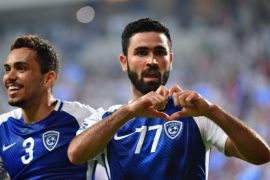 Al Hilal's forward Omar Khribin (R) celebrates with teammates after scoring during the first leg of their AFC Champions League semi-final football match at the Mohammed Bin Zayed Stadium in Abu Dhabi on September 26, 2017. / AFP PHOTO / GIUSEPPE CACACE (Photo credit should read GIUSEPPE CACACE/AFP/Getty Images)