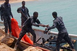 Somali Puntland forces receive weapons seized in a boat on the shores of the Gulf of Aden in the city of Bosasso, Puntland region, Somalia September 23, 2017. REUTERS/Abdiqani Hassan