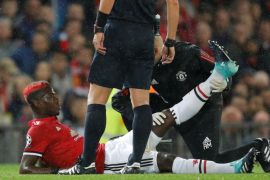 Soccer Football - Champions League - Manchester United vs FC Basel - Old Trafford, Manchester, Britain - September 12, 2017 Manchester United's Paul Pogba receives medical attention after sustaining an injury REUTERS/Darren Staples