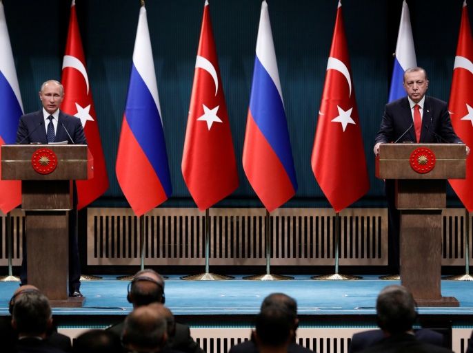 Turkish President Tayyip Erdogan and Russian President Vladimir Putin attend a press conference in Ankara, Turkey, September 28, 2017. REUTERS/Umit Bektas