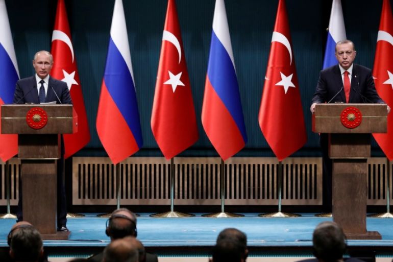 Turkish President Tayyip Erdogan and Russian President Vladimir Putin attend a press conference in Ankara, Turkey, September 28, 2017. REUTERS/Umit Bektas