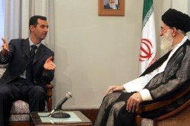 TEHRAN, IRAN: Syrian President Bashar al-Assad (L) meets with Iranian supreme leader Ali Khamenei in Tehran, 08 August 2005. Syrian President Bashar al-Assad, Iran's leading Arab ally, arrived in Tehran for talks with his newly sworn-in counterpart Mahmood Ahmadinejad as the first visit by a foreign leader since Ahmadinejad took the oath of office. Assad is to discuss the situation in neighbouring Iraq, the Palestinian territories, Lebanon and the Shiite militant group Hezbollah, during his two-day visit to Iran. AFP PHOTO/STR (Photo credit should read STR/AFP/Getty Images)