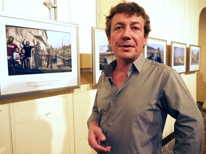 Belgian photojournalist Laurent Van Der Stockt poses at his exhibition 'The Battle of Mosul' during the 29th 'Visa pour l'image' international photojournalism festival on September 7, 2017, in Perpignan, southern France. / AFP PHOTO / RAYMOND ROIG / RESTRICTED TO EDITORIAL USE - MANDATORY MENTION OF THE ARTIST UPON PUBLICATION - TO ILLUSTRATE THE EVENT AS SPECIFIED IN THE CAPTION (Photo credit should read RAYMOND ROIG/AFP/Getty Images)