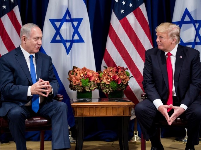 US President Donald Trump listens while Israel's Prime Minister Benjamin Netanyahu makes a statement for the press before a meeting at the Palace Hotel during the 72nd session of the United Nations General Assembly on September 18, 2017, in New York. / AFP PHOTO / Brendan Smialowski (Photo credit should read BRENDAN SMIALOWSKI/AFP/Getty Images)