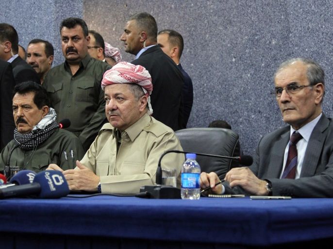 Iraq's Kurdistan region president Massud Barzani (C) attends an assembly with Kirkuk provincial Governor Najim al-Din Karim (R) and Kosrat Rasoul Ali (L), the first Deputy for the Secretary General of the Patriotic Union of Kurdistan (PUK) party, and other representatives of the Peshmerga and Arab, Kurdish, and Iraqi Turkmen tribal leaders in the northern Iraqi city of Kirkuk on September 12, 2017. Iraq's parliament's voted on September 12, 2017 against plans by Kurdish leaders to hold an independence referendum just two weeks before it was to be held, echoing regional criticism of the poll. Barzani, who is organising the referendum, however said from the disputed city of Kirkuk that the poll would be held because 'all other bids' to secure Kurdish rights 'have failed'. / AFP PHOTO / Marwan IBRAHIM (Photo credit should read MARWAN IBRAHIM/AFP/Getty Images)