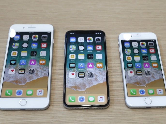(L-R) iPhone 8 Plus, iPhone X and iPhone 8 models are displayed during an Apple launch event in Cupertino, California, U.S. September 12, 2017. REUTERS/Stephen Lam