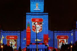 A lighting installation showing a cat, a tiger and a wolf - candidates for the official mascot of the 2018 FIFA World Cup is seen during a presentation on the facade of Moscow State University, part of the Circle of Light International Festival in Moscow, Russia September 23, 2016. REUTERS/Sergei Karpukhin
