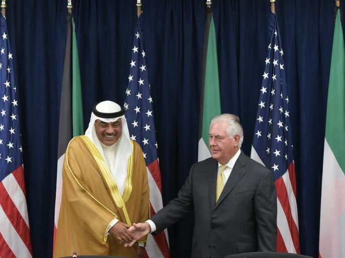 US Secretary of State Rex Tillerson (R) poses with Kuwait's Foreign Minister Sabah al-Khaled al-Sabah ahead of a meeting of the US-Kuwait Strategic Dialogue at the State Department in Washington, DC on September 8, 2017. / AFP PHOTO / Mandel Ngan (Photo credit should read MANDEL NGAN/AFP/Getty Images)