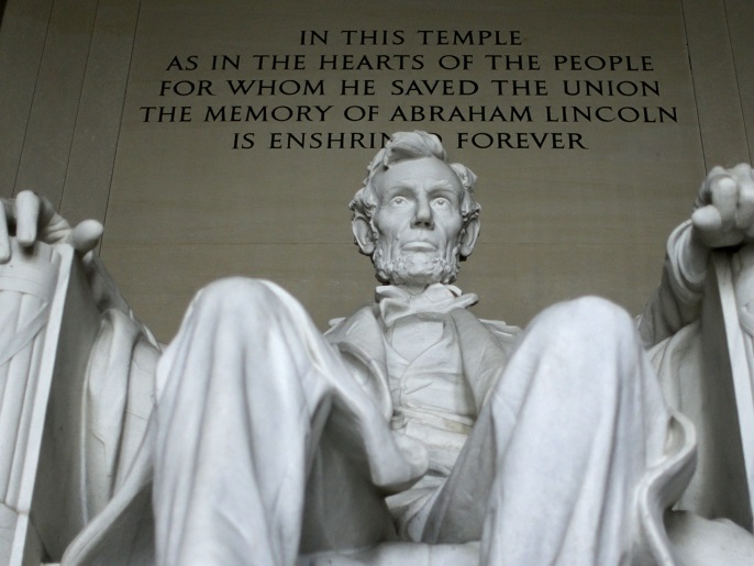 U.S. President Abraham Lincoln's statue at the Lincoln Memorial is seen in Washington March 27, 2015. The 170 ton, 19 foot high statue, formed from 28 blocks of Georgia marble, was sculpted by Daniel Chester French and dedicated in 1922. On April 15 the United States commemorates the 150th anniversary of President Abraham Lincoln's assassination. Events will include the re-enactment of his funeral in Springfield, Illinois, as well as talks and plays at Ford's Theatre in Washington D.C., where Confederate sympathiser John Wilkes Booth shot him in 1865. Lincoln, who kept the Union together in the American Civil War and helped secure the end of slavery, has enduring appeal both in the United States and worldwide: his life is celebrated at the Lincoln Memorial in Washington D.C., five-dollar bills carry his image and Stephen Spielberg directed the 2012 film bearing the 16th president's name. REUTERS/Gary CameronPICTURE 7 OF 30 FOR WIDER IMAGE STORY 'MEMORIES OF LINCOLN'SEARCH '150TH ASSASSINATION' FOR ALL IMAGES