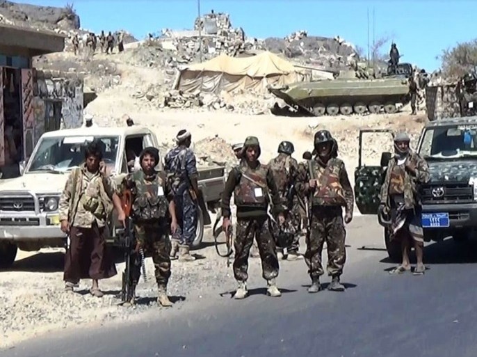 Shiite Huthi fighters loyal to the Republican Guard forces supporting former Yemeni president Ali Abdullah Saleh's stand near armed vehicles in the Al-Bayda province, south of Sanaa, on February 10, 2015 as they clash with armed militiamen. Yemen, which is riven by tribal divisions and awash with weapons, has been engulfed in crisis since veteran strongman Ali Abdullah Saleh was forced from power in 2012 following a bloody year-long uprising against his rule. AFP PHOTO / STR (Photo credit should read STR/AFP/Getty Images)