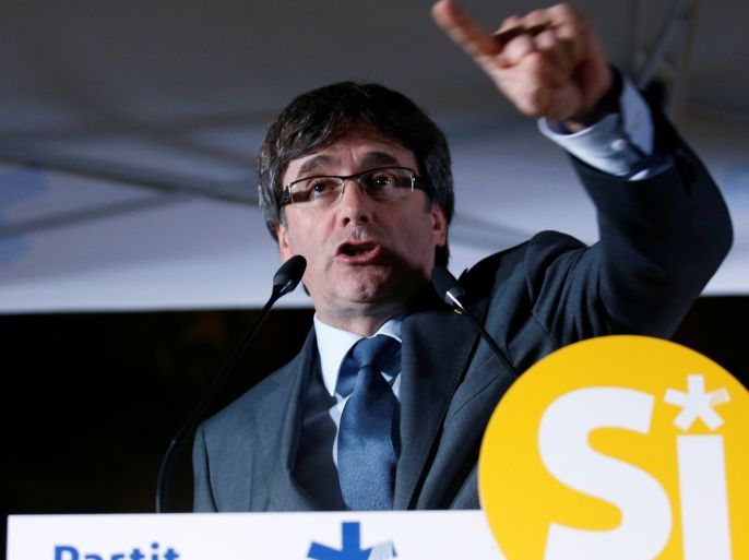 Catalan regional President Carles Puigdemont gestures during a Catalan pro-independence meeting for the referendum on October 1 in Girona, Spain, September 18, 2017. REUTERS/Albert Gea