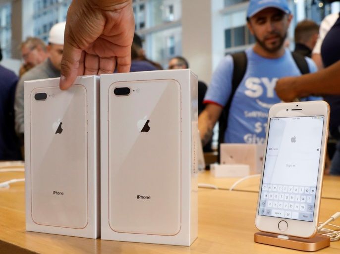 Two new iPhone 8's are placed out during a sale at the 5th Avenue Apple store in New York City, U.S., September 22, 2017. REUTERS/Brendan McDermid