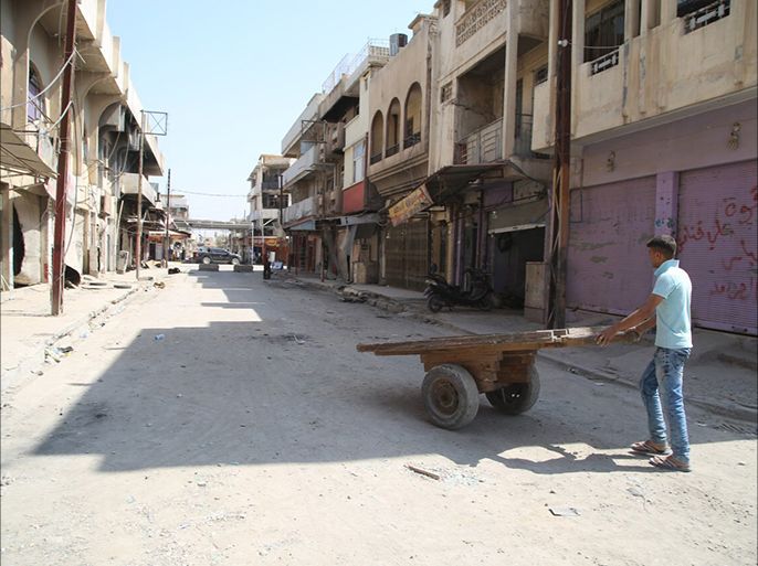 تعرضت معظم المناطق التجارية غربي الموصل إلى عمليات تدمير واسعة