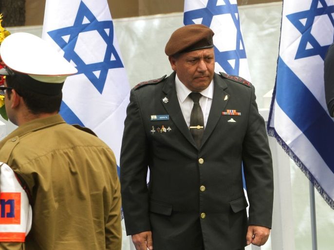 Israeli Chief of Staff Gadi Eizenkot (C) attends a ceremony at the Mount Herzel military cemetery in Jerusalem as they mark Remembrance Day, commemorating fallen soldiers in the country's conflicts, on May 1, 2017.Israel is marking Remembrance (or Memorial) Day to commemorate 23544 fallen soldiers and 3117 civilians killed during hostile attacks since 1948, just before the celebrations for the 69th anniversary of its creation according to the Jewish calendar. / AFP PHOTO / äàøõ / GIL COHEN-MAGEN (Photo credit should read GIL COHEN-MAGEN/AFP/Getty Images)