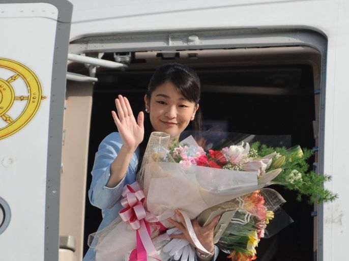 Japan's Princess Mako waves prior to her departure from Paro Airport in Bhutan on June 7, 2017. Japan's Princess Mako, the oldest of Emperor Akihito's grandchildren, concluded her official visit to Bhutan on June 7. / AFP PHOTO / Diptendu DUTTA (Photo credit should read DIPTENDU DUTTA/AFP/Getty Images)