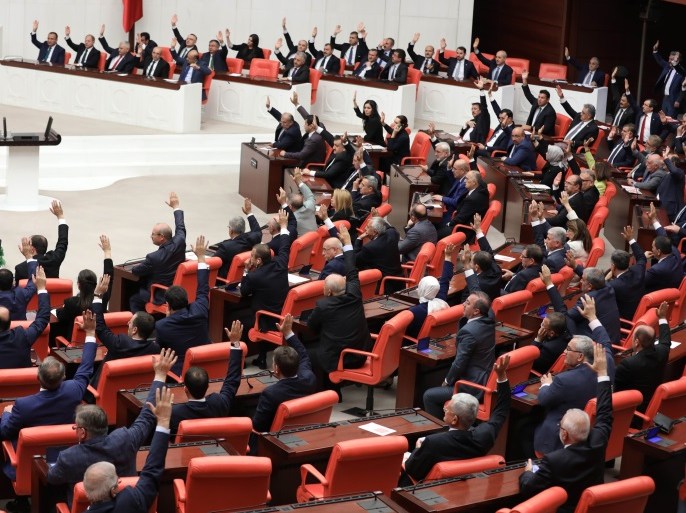 Turkish parliament votes during an emergency session to ?extend military operations in neighbouring Iraq and Syria at the Grand National Assembly of Turkey (TBMM) in Ankara on September 23, 2017.?The Turkish parliament on September 23 approved a one-year extension of an existing mandate to use Turkish troops abroad in Syria and Iraq, two days before Iraq's Kurdish region holds a controversial independence referendum. / AFP PHOTO / ADEM ALTAN (Photo credit should read ADEM ALTAN/AFP/Getty Images)
