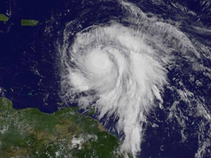 Hurricane Maria is shown in the Atlantic Ocean in this NOAA's GOES East satellite as it strengthened to a Category 3 hurricane just east of the Leeward Islands at 10:45 a.m. EDT (1445 UTC) on September 18, 2017. Courtesy NASA/NOAA GOES Project/Handout via REUTERS ATTENTION EDITORS - THIS IMAGE WAS PROVIDED BY A THIRD PARTY.