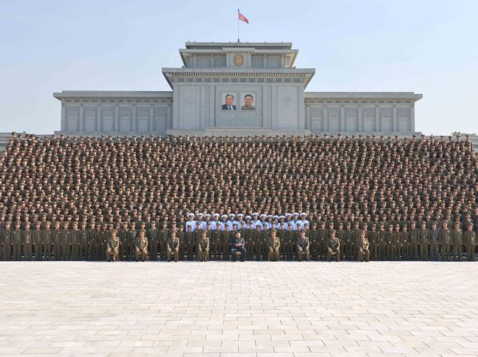 North Korean leader Kim Jong Un attends a photo session with attendants in the fourth Active Secretaries of Primary Organization of KPA Youth in this undated photo released by North Korea's Korean Central News Agency (KCNA) in Pyongyang September 1, 2017. KCNA via REUTERS ATTENTION EDITORS - THIS PICTURE WAS PROVIDED BY A THIRD PARTY. REUTERS IS UNABLE TO INDEPENDENTLY VERIFY THE AUTHENTICITY, CONTENT, LOCATION OR DATE OF THIS IMAGE. NOT FOR SALE FOR MARKETING OR