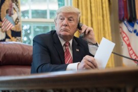 US President Donald Trump waits to speak on the phone with Irish Prime Minister Leo Varadkar to congratulate him on his recent election victory in the Oval Office at the White House in Washington, DC, on June 27, 2017. / AFP PHOTO / NICHOLAS KAMM (Photo credit should read NICHOLAS KAMM/AFP/Getty Images)