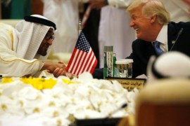U.S. President Donald Trump shakes hands with Abu Dhabi Crown Prince and Deputy Supreme Commander of the United Arab Emirates (UAE) Armed Forces Mohammed bin Zayed al-Nahayan as he sits down to a meeting with of Gulf Cooperation Council leaders during their summit in Riyadh, Saudi Arabia May 21, 2017. REUTERS/Jonathan Ernst