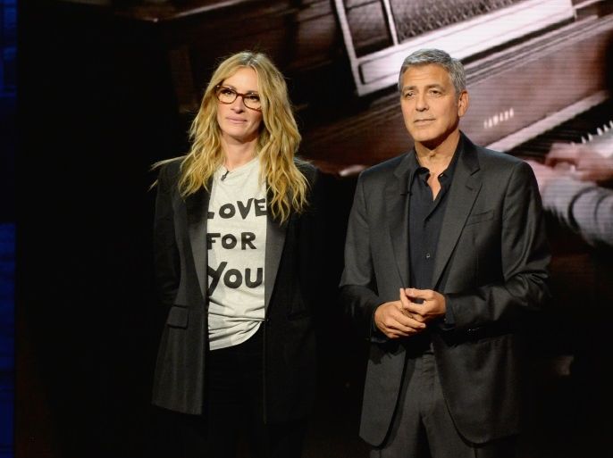 UNIVERSAL CITY, CA - SEPTEMBER 12: In this handout photo provided by Hand in Hand, Julia Roberts and George Clooney attend Hand in Hand: A Benefit for Hurricane Relief at Universal Studios AMC on September 12, 2017 in Universal City, California. (Photo by Kevin Mazur/Hand in Hand/Getty Images)