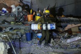 An Israeli rescue team searches for survivors in the rubble of a collapsed building after an earthquake in Mexico City, Mexico September 23, 2017. REUTERS/Henry Romero