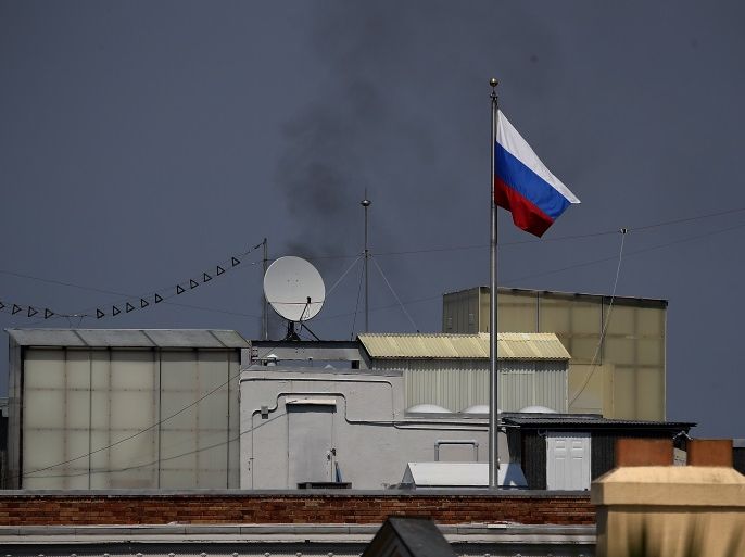 SAN FRANCISCO, CA - SEPTEMBER 01: Black smoke billows from a chimney on top of the Russian consulate on September 1, 2017 in San Francisco, California. In response to a Russian government demand for the United States to cut its diplomatic staff in Russia by 455, the Trump administration ordered the closure of three consular offices in the San Francisco, New York and Washington. (Photo by Justin Sullivan/Getty Images)