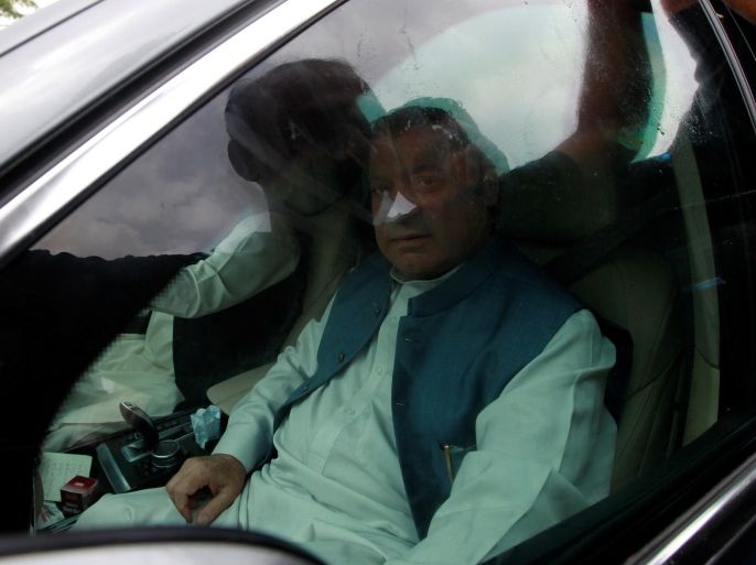 Former Pakistani Prime Minister Nawaz Sharif is seen sitting in his car after starting his journey from Rawalpindi to Lahore, Pakistan August 10, 2017. REUTERS/Faisal Mahmood