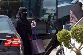 A Saudi woman disembarks from a car outside a mall in the Saudi capital Riyadh on September 27, 2017.Saudi Arabia will allow women to drive from next June, state media said on September 26, 2017 in a historic decision that makes the Gulf kingdom the last country in the world to permit women behind the wheel. The shock announcement comes after a years-long resistance from women's rights activists, some of whom were jailed for defying the ban on female driving. / AFP PHOTO / FAYEZ NURELDINE (Photo credit should read FAYEZ NURELDINE/AFP/Getty Images)