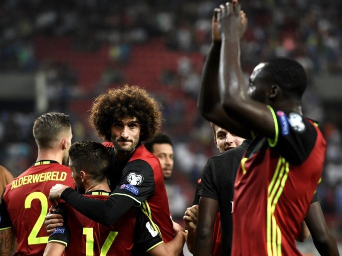Belgium's players including Marouane Fellani (C) celebrate after their team's victory against Greece in their Group H 2018 FIFA World Cup qualifying football match between Greece and Belgium at The Georgios Karaiskakis Stadium in Piraeus near Athens on September 3, 2017. / AFP PHOTO / ARIS MESSINIS (Photo credit should read ARIS MESSINIS/AFP/Getty Images)