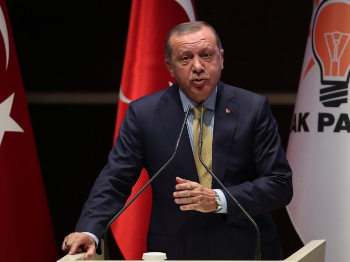 Turkish President Tayyip Erdogan addresses his ruling AK Party (AKP) members during a meeting at his party headquarters in Ankara, Turkey, September 6, 2017. REUTERS/Umit Bektas