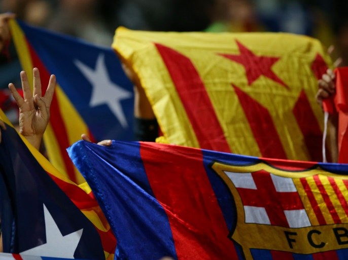 Soccer Football - Santander La Liga - Girona vs FC Barcelona - Estadi Montilivi, Girona, Spain - September 23, 2017 Barcelona fans hold up Catalonia flags REUTERS/Albert Gea