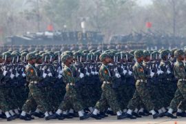 Soldiers parade to mark the 70th anniversary of Armed Forces Day in Myanmar's capital Naypyitaw, March 27, 2015. Myanmar's powerful army chief Min Aung Hlaing and his deputy are slated to extend their terms for another five years, a local newspaper said on February 13, 2016, as the military and democracy champion Aung San Suu Kyi negotiate the terms of transition. Picture taken March 27, 2015. REUTERS/Soe Zeya Tun